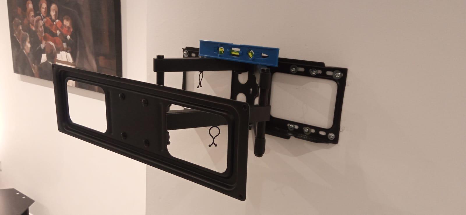 TV wall bracket installation by AMICAS Technology